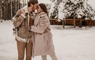 Couple kiss in snow: 10 Must-Know Tips for Writing Christmas TV-Movies
